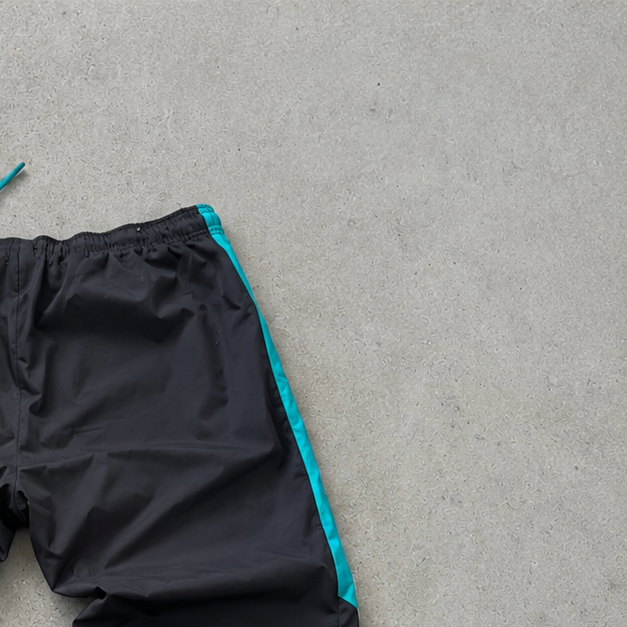 FC Barcelona NIKE Rain Pants Black / Türkis Rare (M)