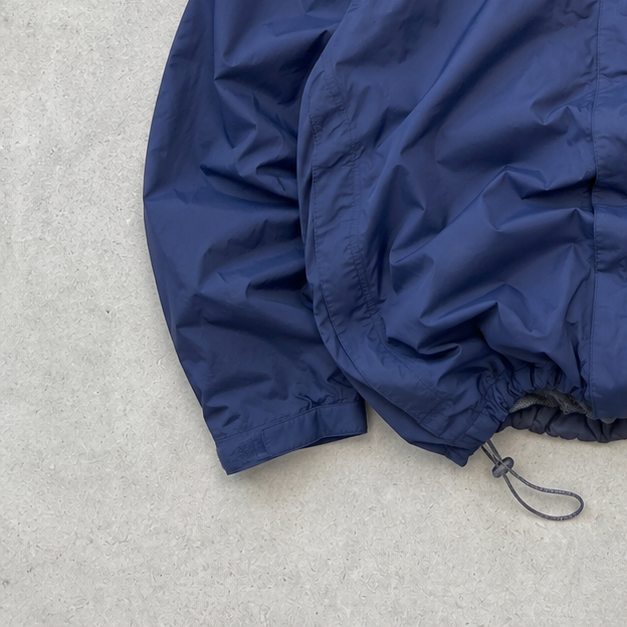 The North Face Windbreaker Blue Rare (XL)