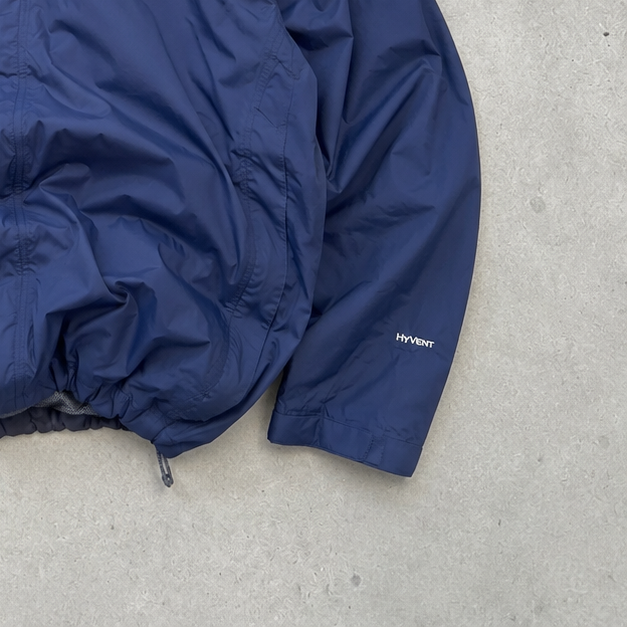 The North Face Windbreaker Blue Rare (XL)