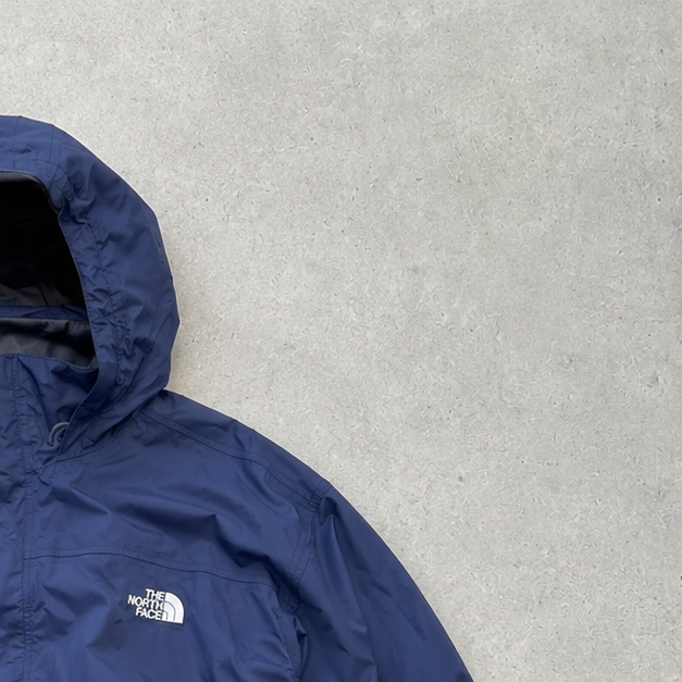 The North Face Windbreaker Blue Rare (XL)
