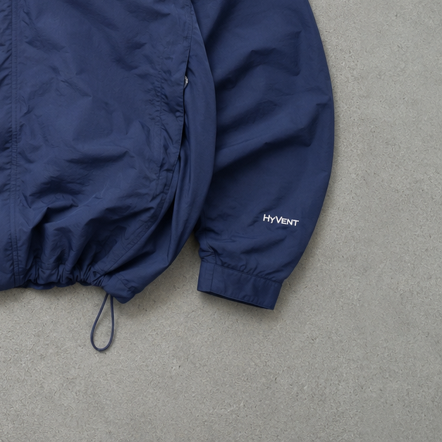 The North Face Windbreaker Blue Rare (XL)