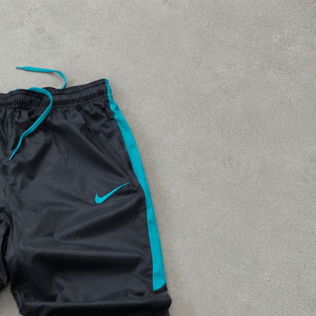 FC Barcelona NIKE Rain Pants Black / Türkis Rare (M)